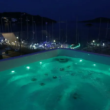 A Luxurious Seafront Penthouse Overlooking The Picturesque Harbour Of